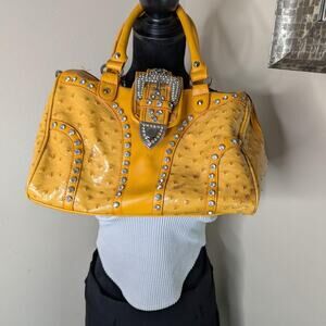 Yellow ostrich studded with buckle purse